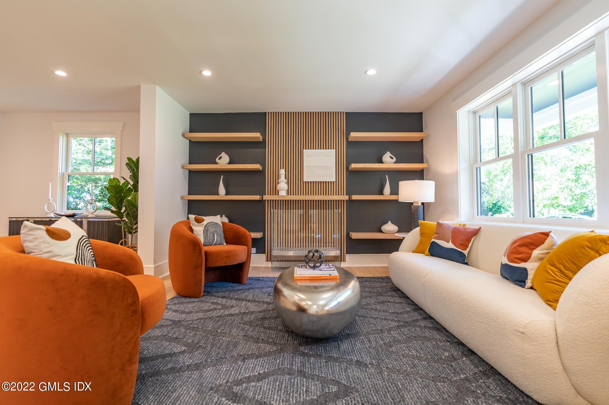 40 Halsey Drive Old Greenwich, CT 06870 - Photo 3 of 40 a living room with furniture and a large window