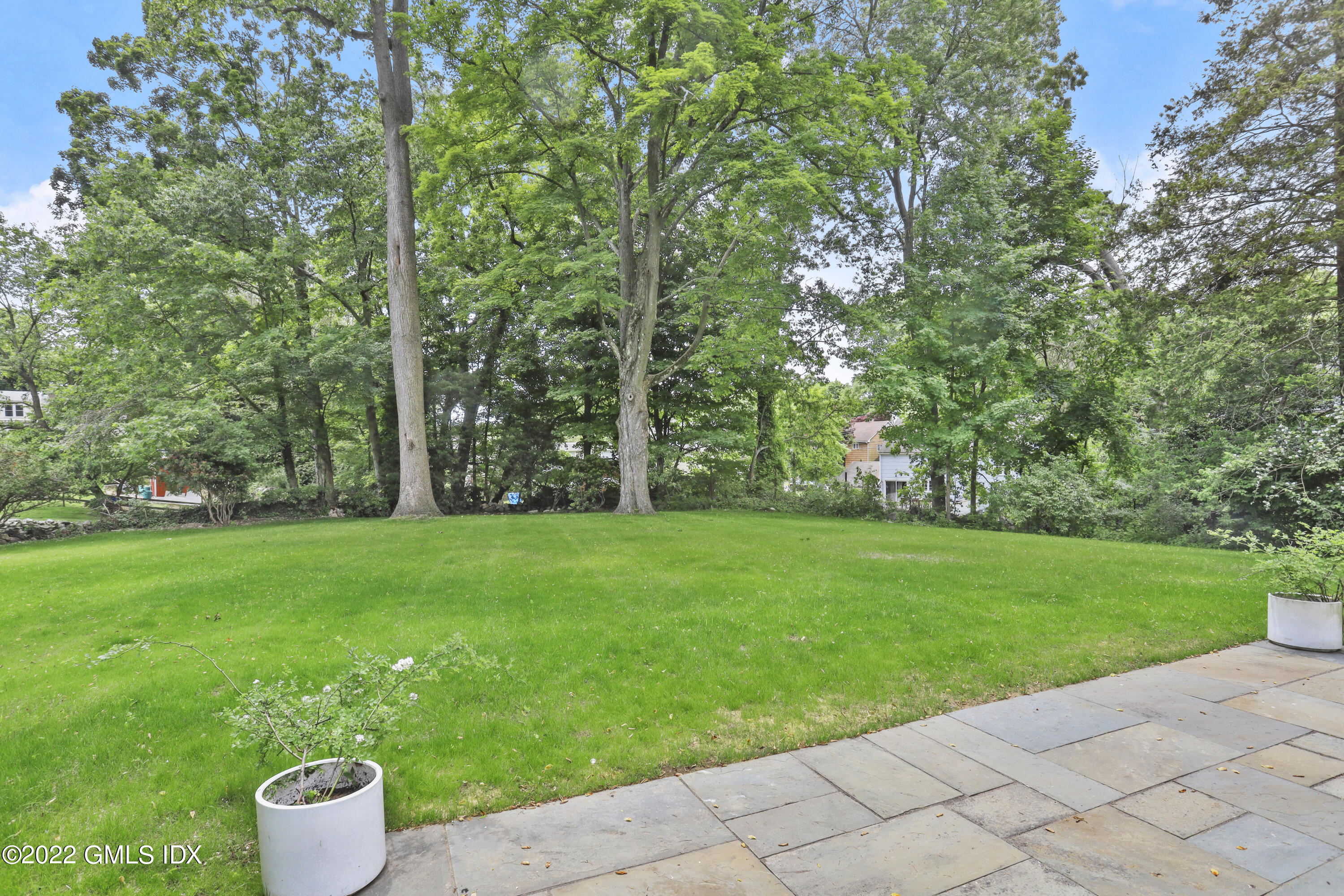 40 Halsey Drive Old Greenwich, CT 06870 - Photo 35 of 40 a view of a garden with trees