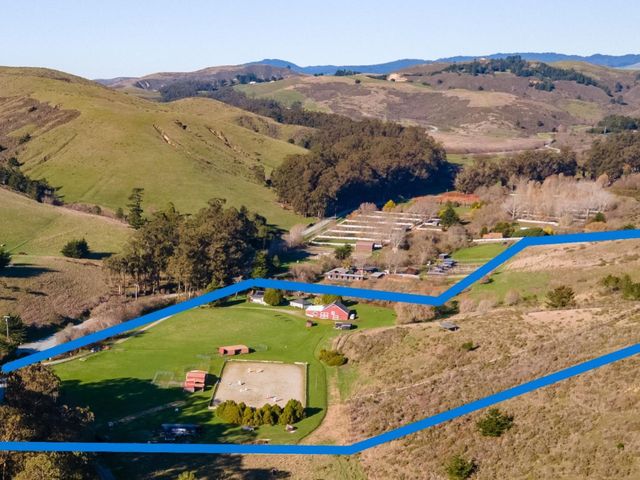 a view of an ocean and city