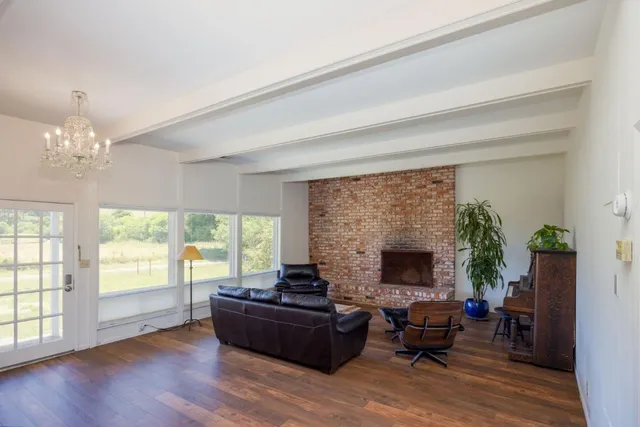 a kitchen with granite countertop stainless steel appliances a sink and counter space