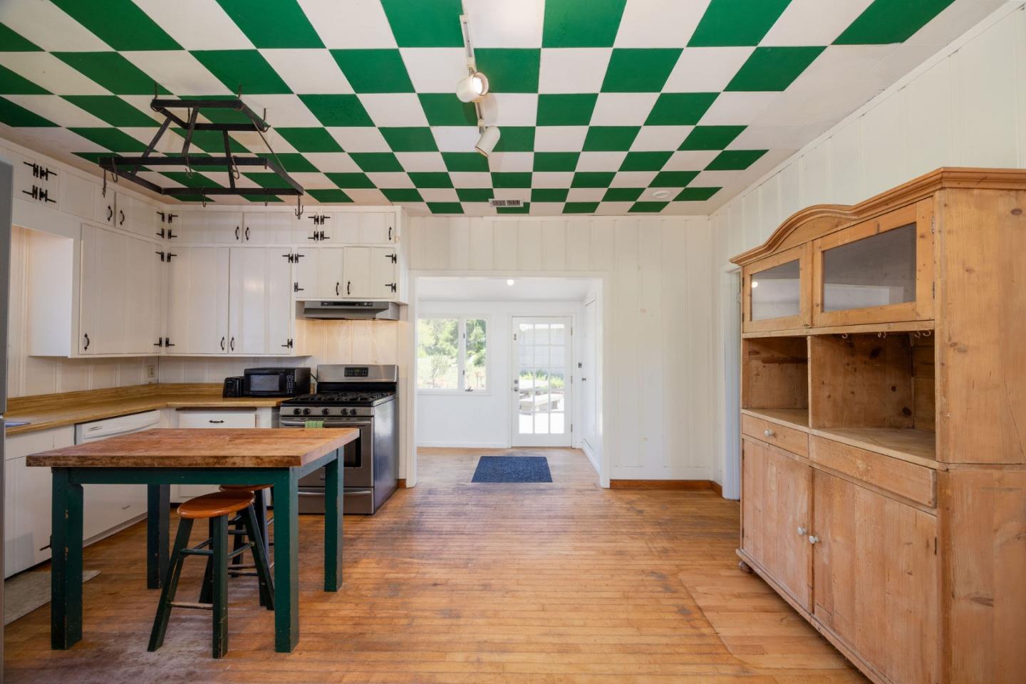 1650 Stage Road Pescadero, CA 94060 - Photo 16 of 55 a room with stainless steel appliances and chandelier