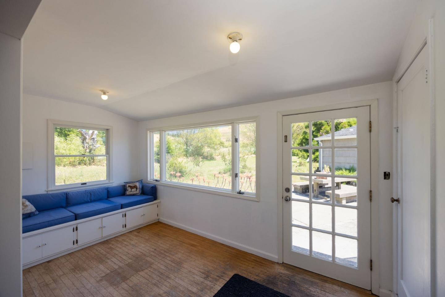 1650 Stage Road Pescadero, CA 94060 - Photo 19 of 55 a living room with furniture and a window