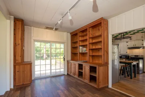 a bed room with a bed and a window