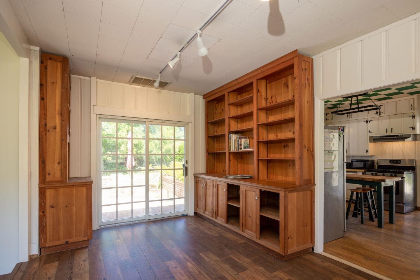 1650 Stage Road Pescadero, CA 94060 - Photo 20 of 55 a view of a kitchen with furniture and wooden floor