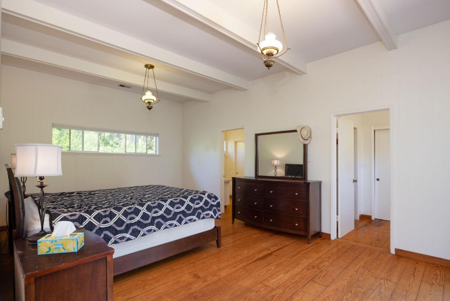 1650 Stage Road Pescadero, CA 94060 - Photo 22 of 55 a bed room with a bed and a window