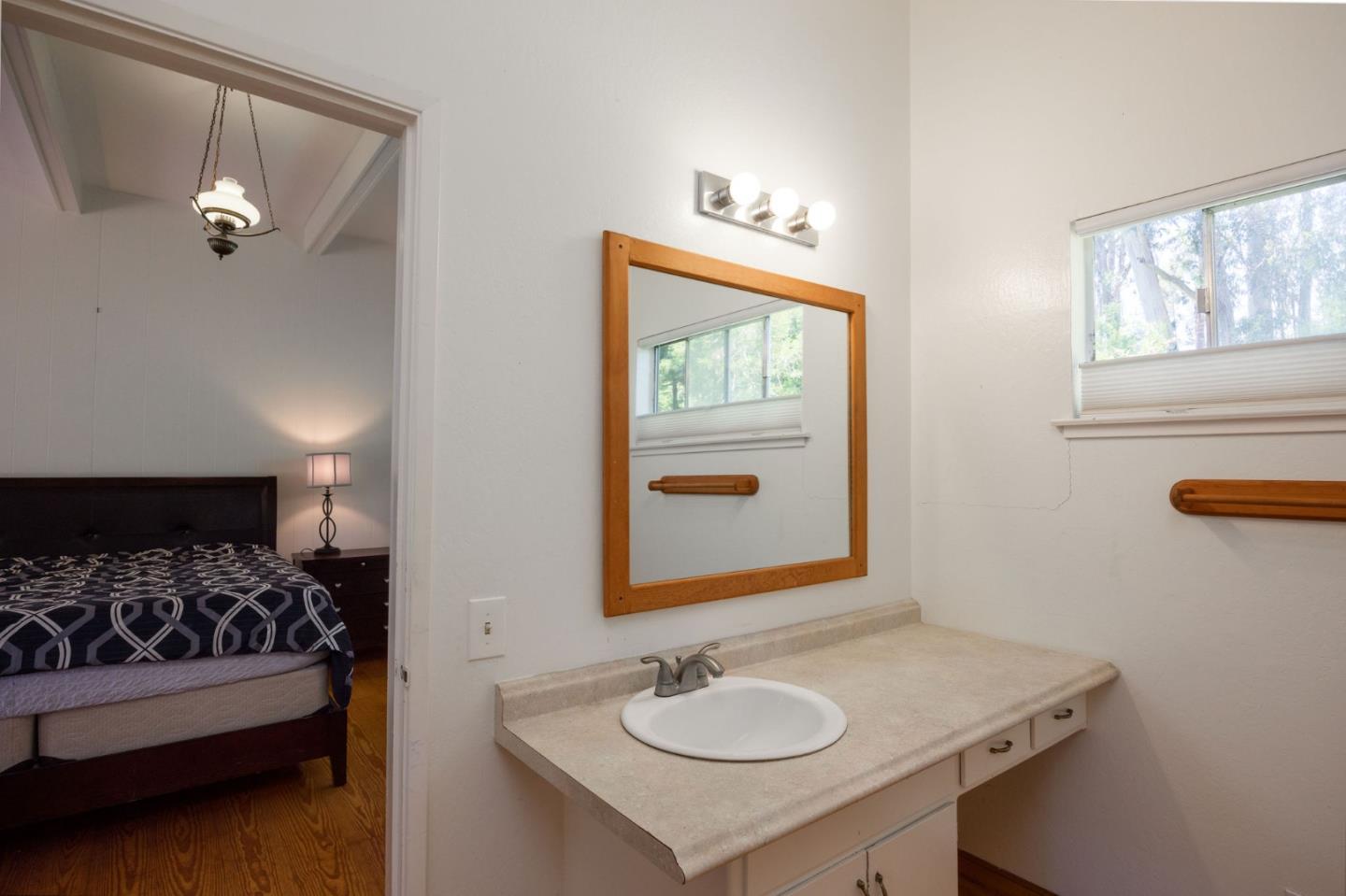 1650 Stage Road Pescadero, CA 94060 - Photo 24 of 55 a bathroom with a sink and a mirror