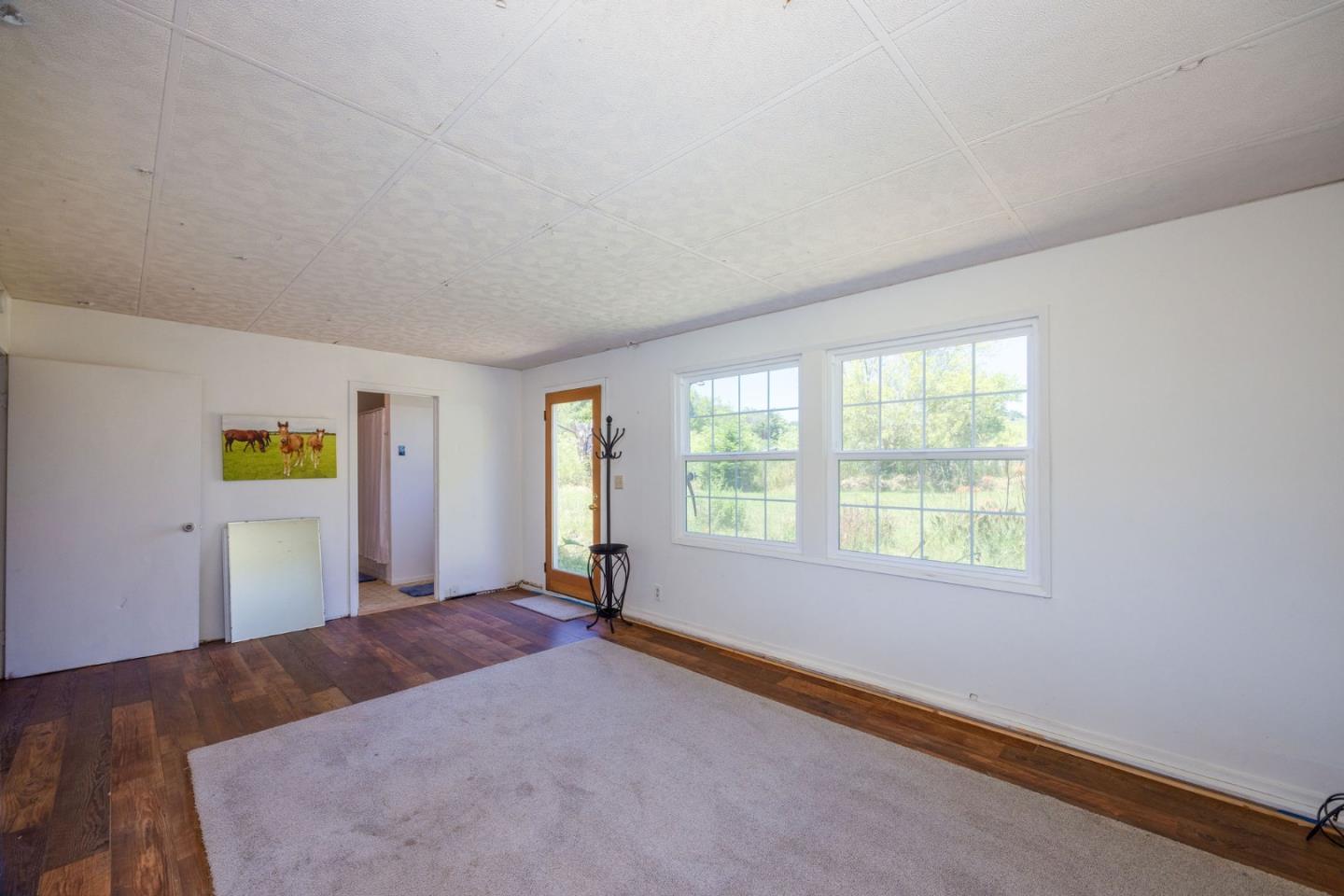 1650 Stage Road Pescadero, CA 94060 - Photo 44 of 55 a bed room with a bed and a window