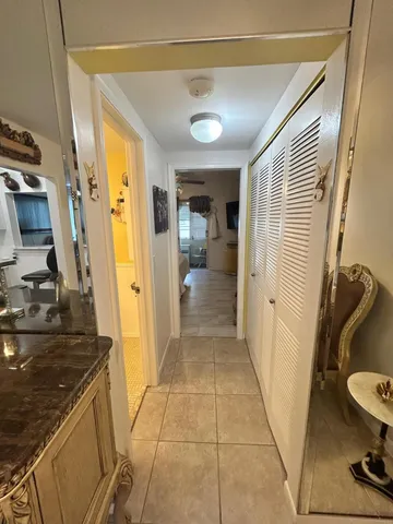 a bathroom with a sink a toilet and a shower