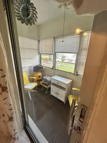 a view of a living room with furniture