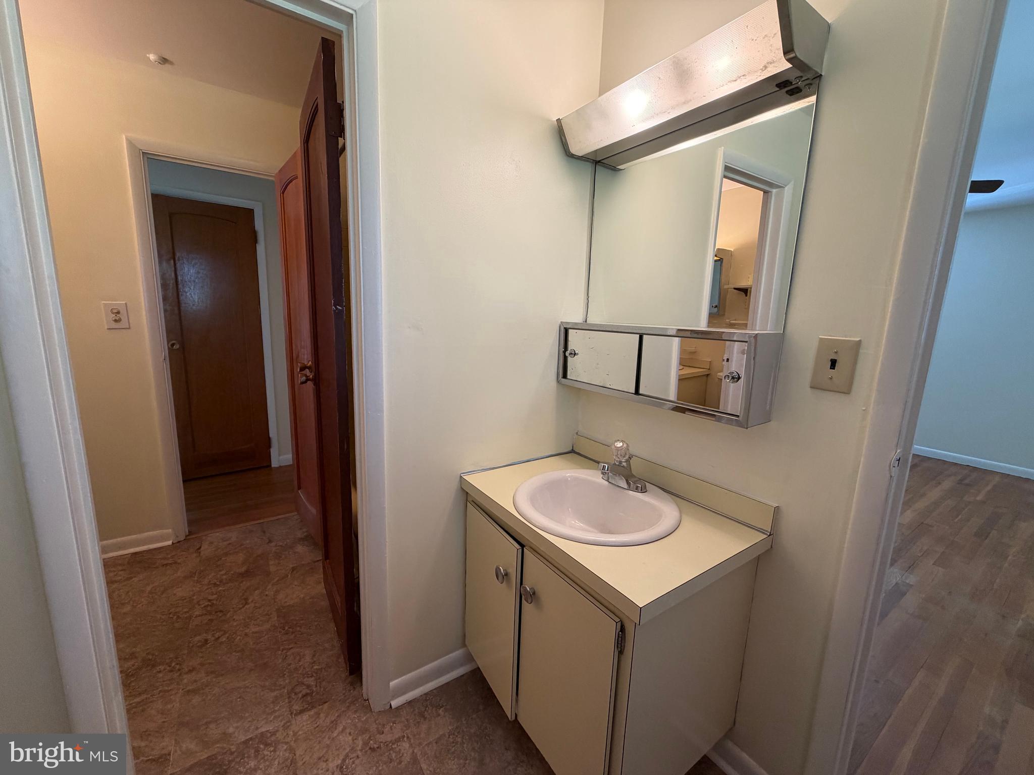 3622 Jeff Road Lanham, MD 20706 - Photo 11 of 36 Upstairs Bath/ Powder Rm to Primary Bedrm