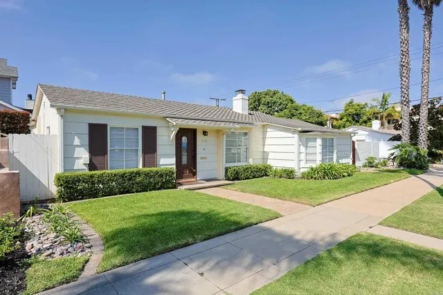 front view of a house and a yard