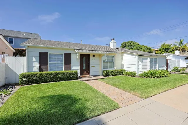 front view of a house and a yard