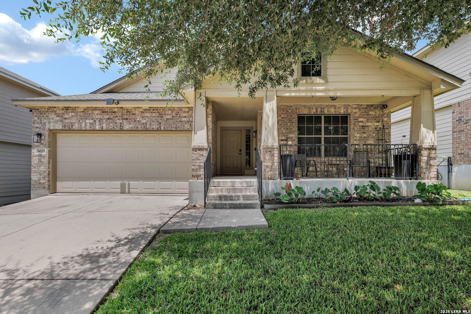 4015 Shervin Way Converse, TX 78109 - Photo 1 of 43 a front view of a house with a garden and plants