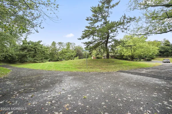 a view of a golf course with a yard