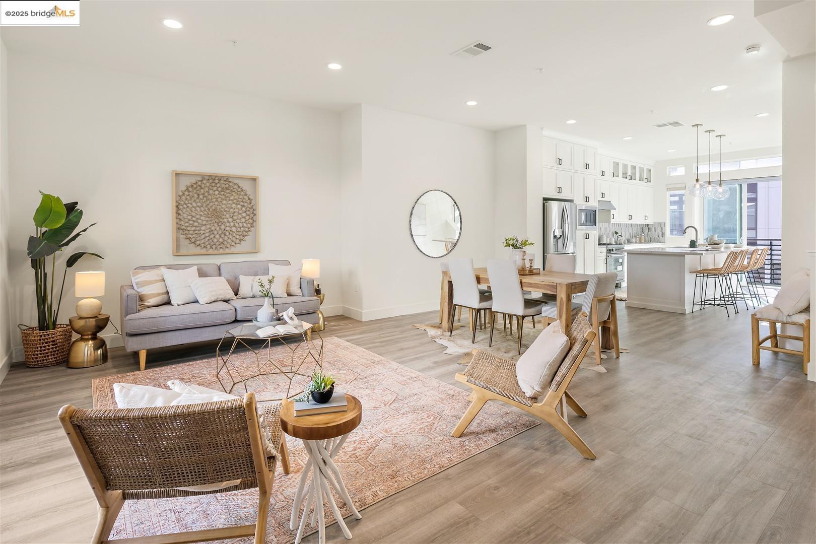 Living room featuring recessed lighting and light wood-type flooring