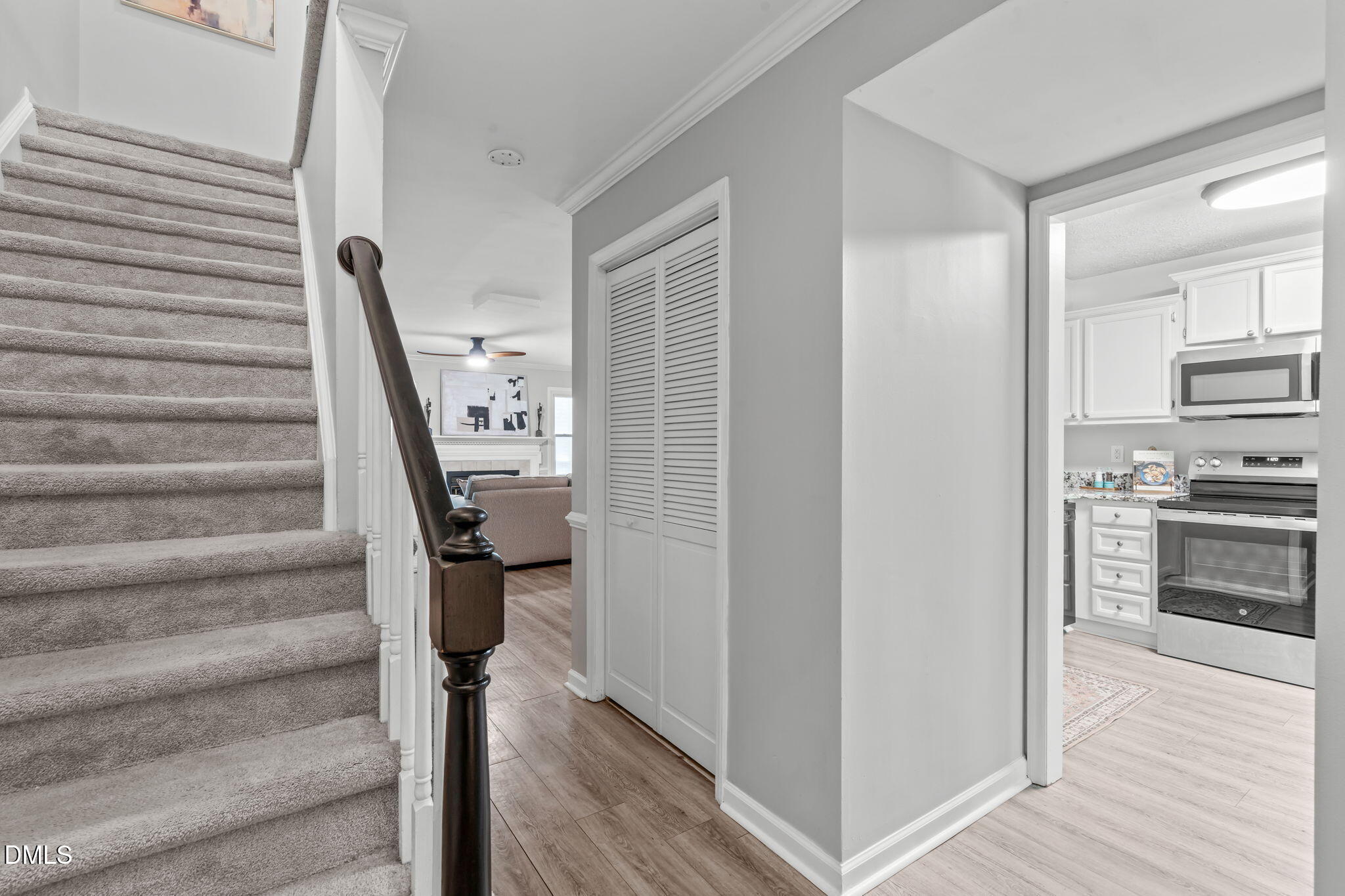 203 Oak Hollow Court Raleigh, NC 27613 - Photo 4 of 37 a view of entryway and hall with wooden floor