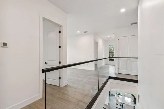 a view of entryway with wooden floor