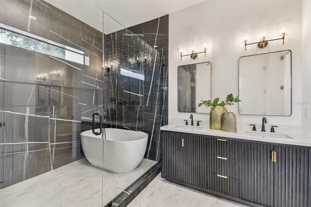 a bathroom with a sink and mirror