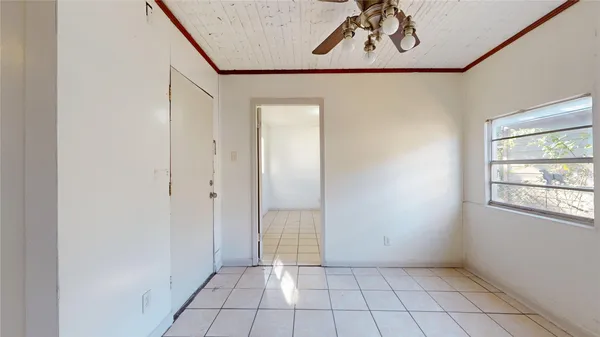 a view of an empty room and window