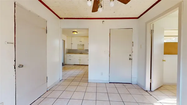 a spacious bathroom with a glass door shower