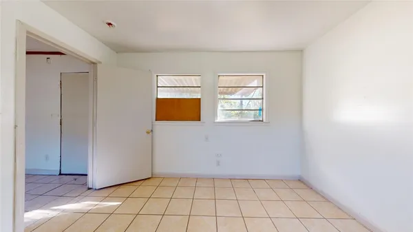 a view of an empty room and window