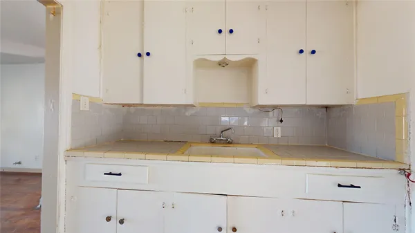 a view of kitchen cabinets