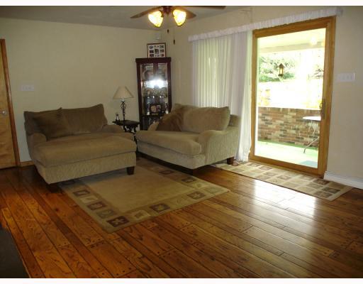 163 Taylor Road West Newton, PA 15089 - Photo 4 of 8 Den/Family/Great Room. A new Marvin sliding glass door in the Family room exits to the covered brick porch and beautiful back yard!
