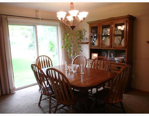 163 Taylor Road West Newton, PA 15089 - Photo 6 of 8 Dining Room. Newer neutral carpet and light fixture enhance the formal Dining Room that has a sliding glass door to appreciate the back yard and fabulous view!