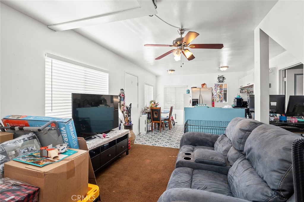 5355 Cogswell Road El Monte, CA 91732 - Photo 15 of 33 a living room with furniture and a flat screen tv