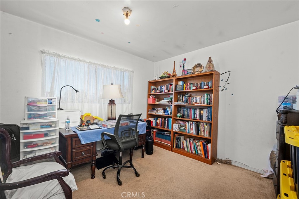 5355 Cogswell Road El Monte, CA 91732 - Photo 20 of 33 a workspace with a bookshelf