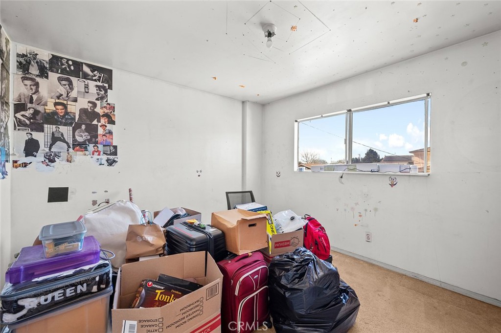 5355 Cogswell Road El Monte, CA 91732 - Photo 22 of 33 a living room with furniture and a window