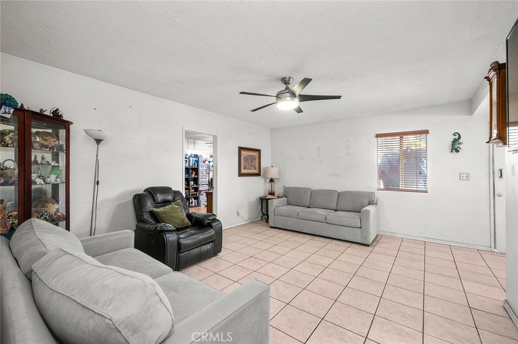 5355 Cogswell Road El Monte, CA 91732 - Photo 6 of 33 a living room with furniture and a view of kitchen
