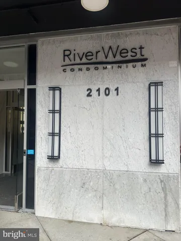 a close view of a utility room with washer and dryer