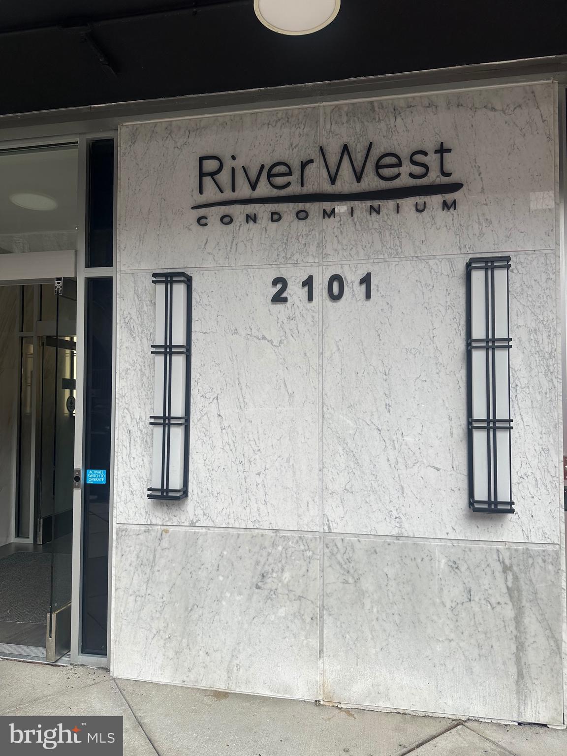 a close view of a utility room with washer and dryer