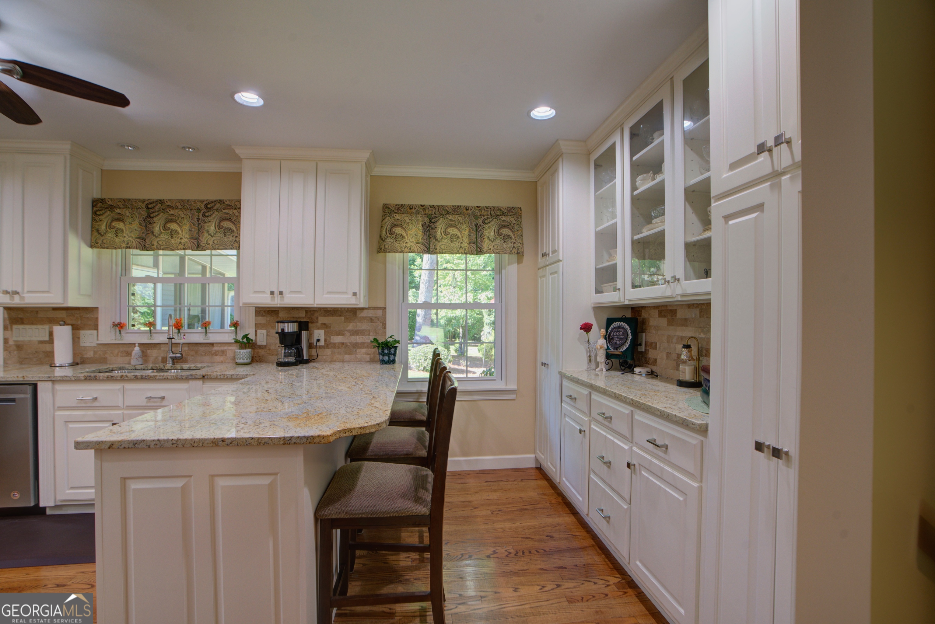 204 Green View Road Southwest Rome, GA 30165 - Photo 32 of 62 a kitchen with stainless steel appliances granite countertop a stove a sink and a refrigerator