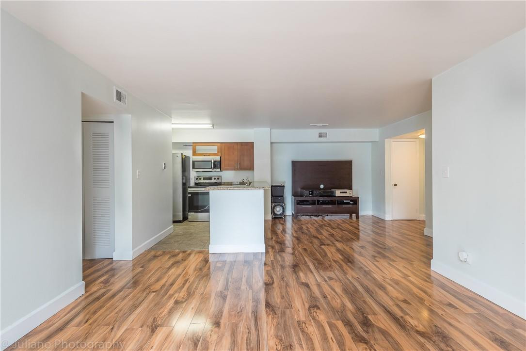 560 South Park Road, Unit 247 Hollywood, FL 33021 - Photo 6 of 21 a view of kitchen with furniture and wooden floor