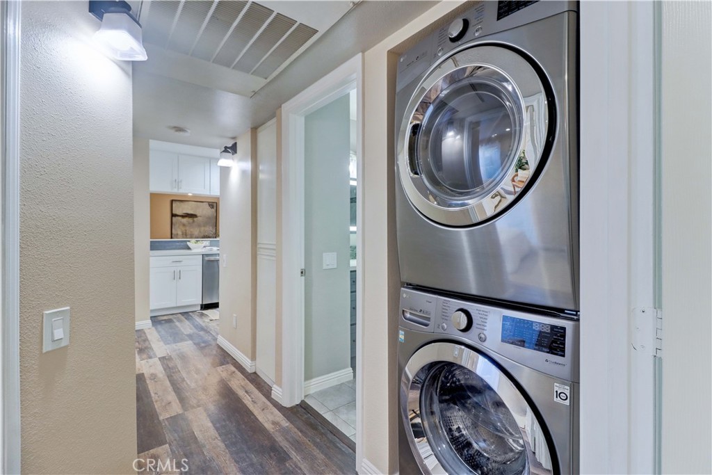 3605 East Anaheim Street, Unit 102 Long Beach, CA 90804 - Photo 31 of 37 a view of a hallway with washer and dryer
