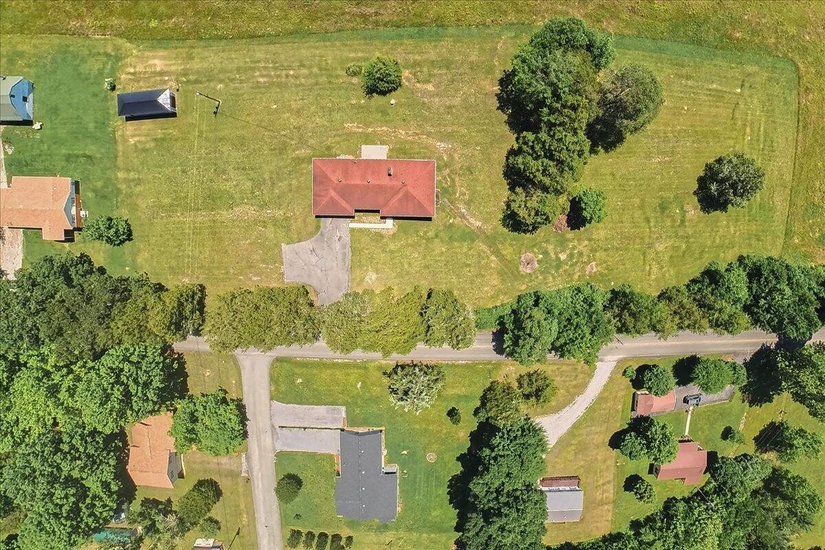 858 Main Street Decatur, TN 37322 - Photo 58 of 65 an aerial view of residential house with outdoor space and swimming pool