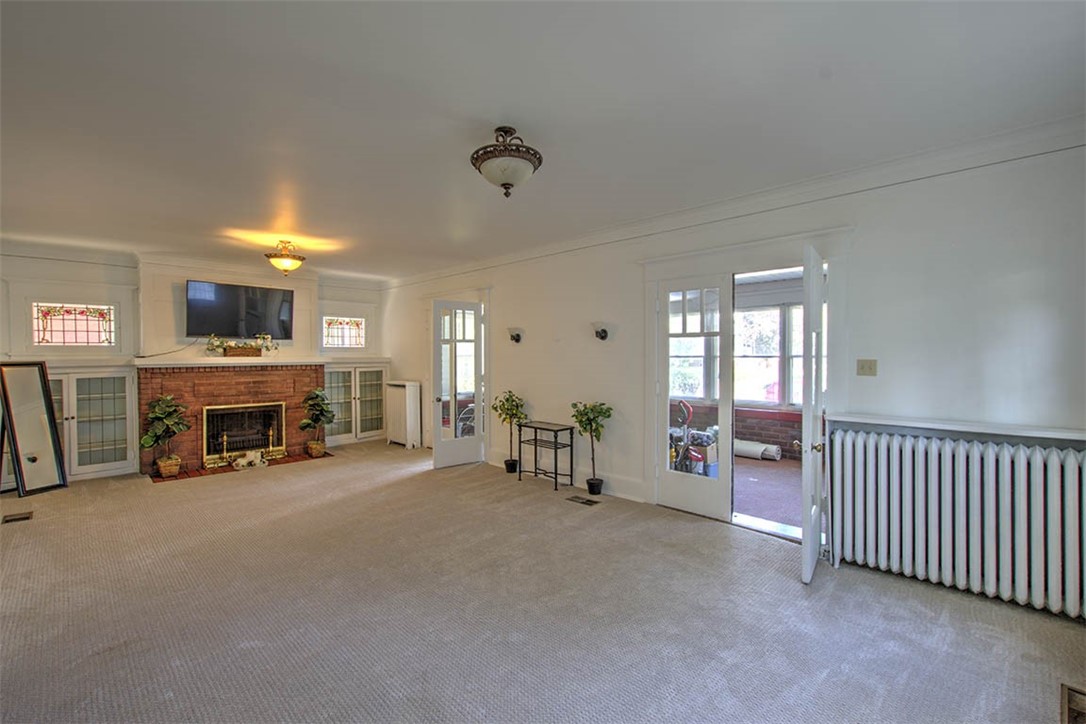 531 West William Street Decatur, IL 62522 - Photo 6 of 28 a view of a livingroom with furniture and a fireplace
