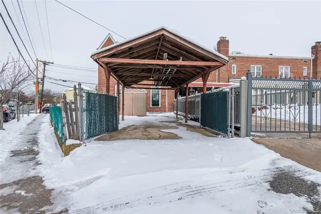 a view of car parked in front of house