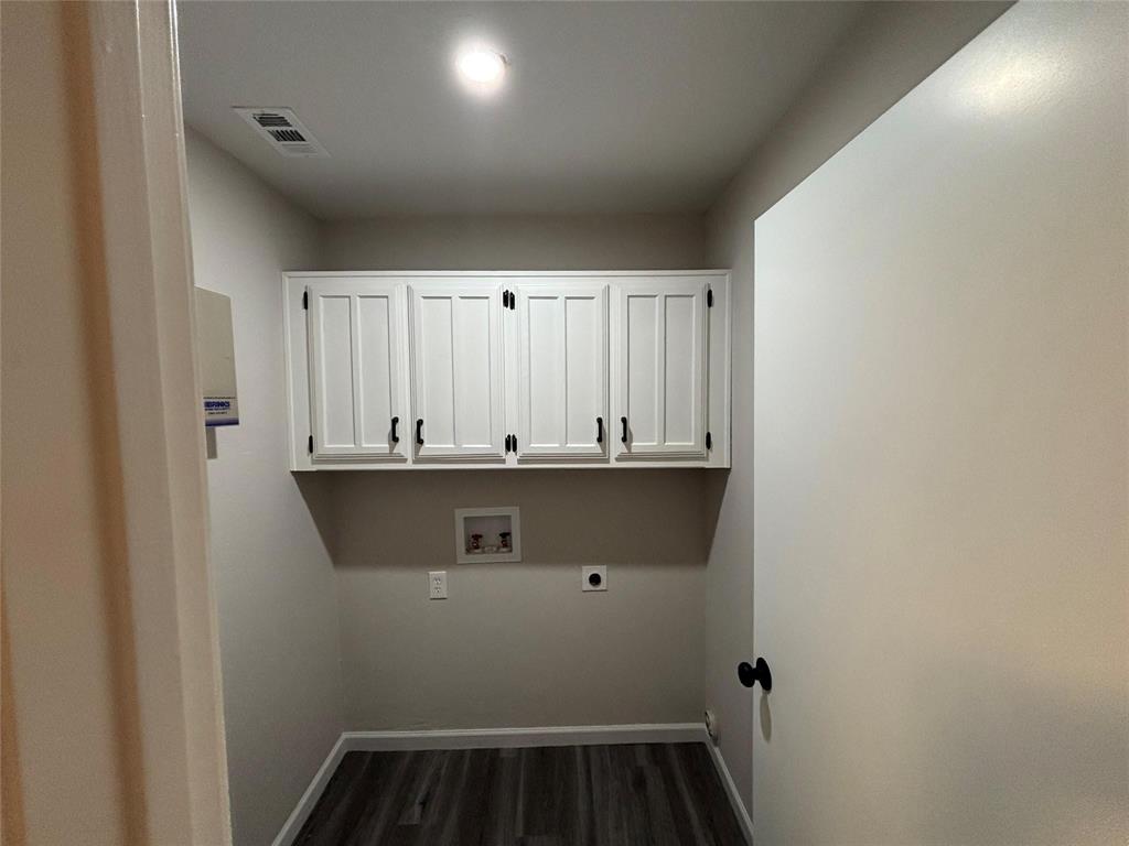 8455 Sugarberry Road Dallas, TX 75249 - Photo 16 of 18 a view of utility room