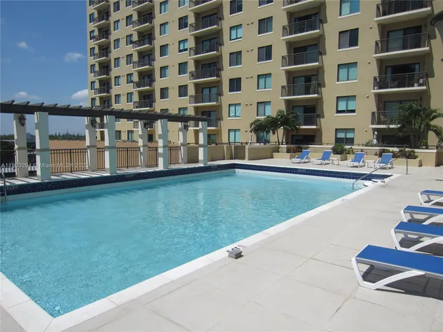 a view of building with yard