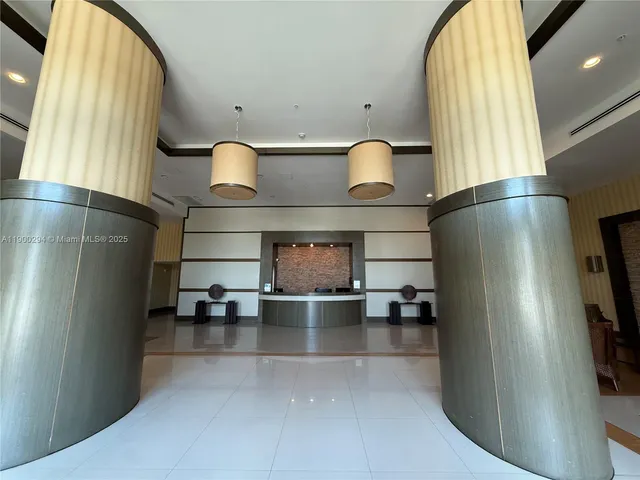 a view of a living room and dining room