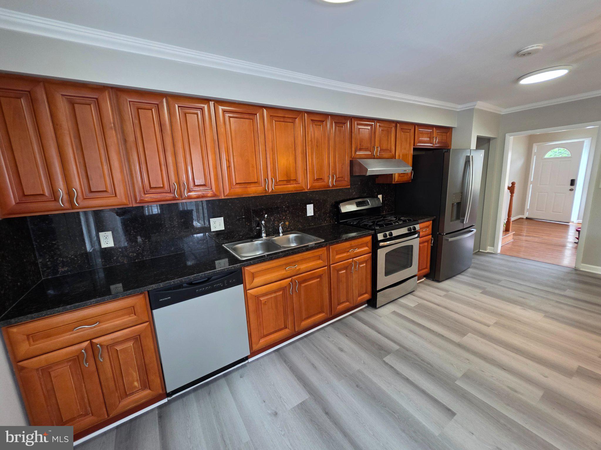 5915 Charnwood Road Catonsville, MD 21228 - Photo 4 of 21 Modern kitchen with rich wood accents.