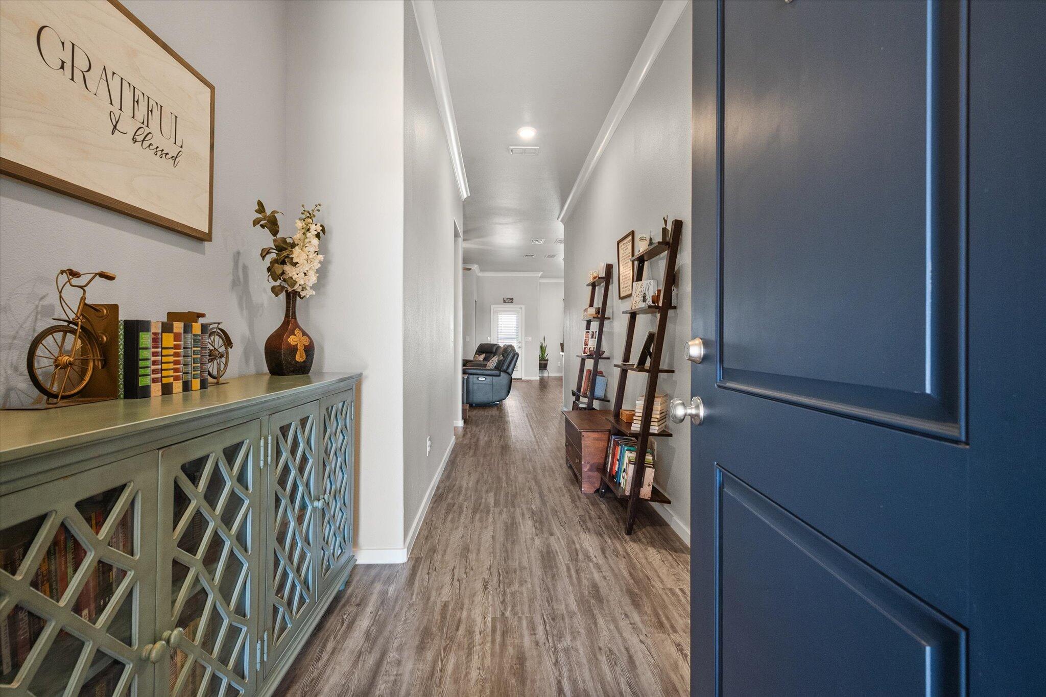 2010 142nd Street Lubbock, TX 79423 - Photo 5 of 33 a view of entryway with wooden floor