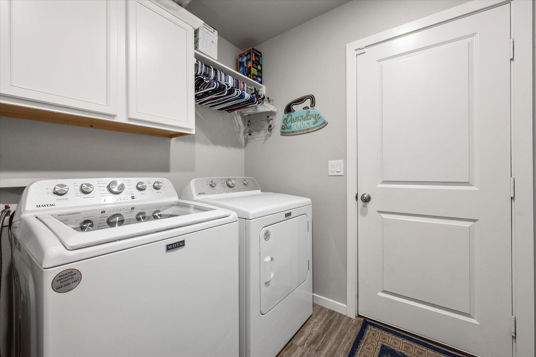 2010 142nd Street Lubbock, TX 79423 - Photo 10 of 33 a utility room with dryer and washer