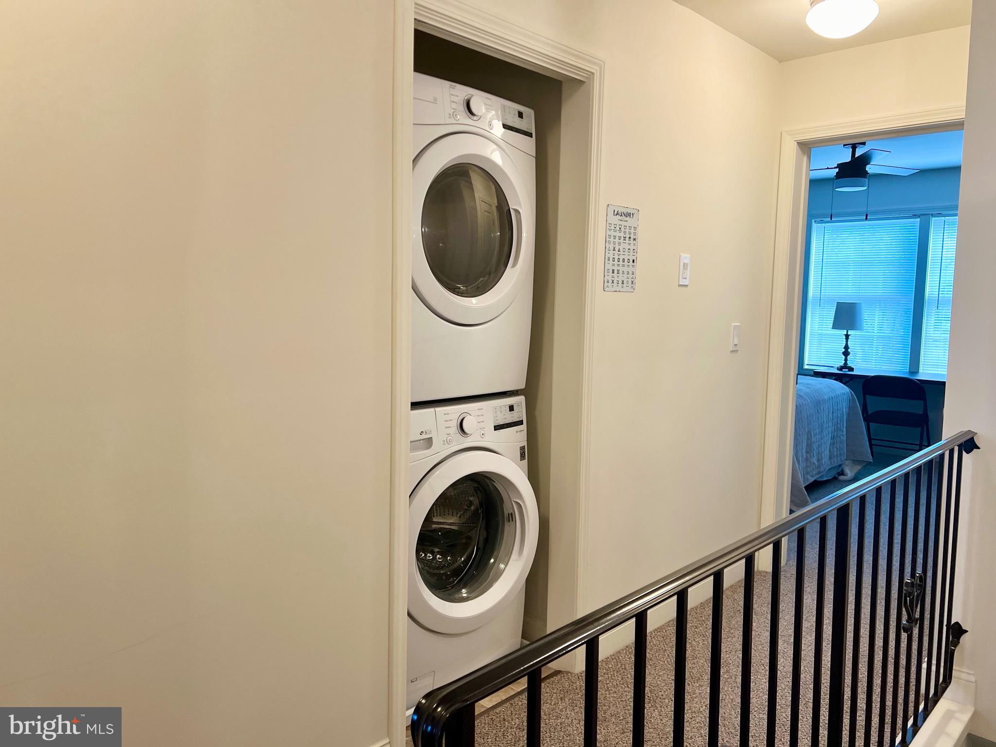 46 West Pittsfield Street Pennsville, NJ 08070 - Photo 15 of 25 a view of a hallway with washer and dryer