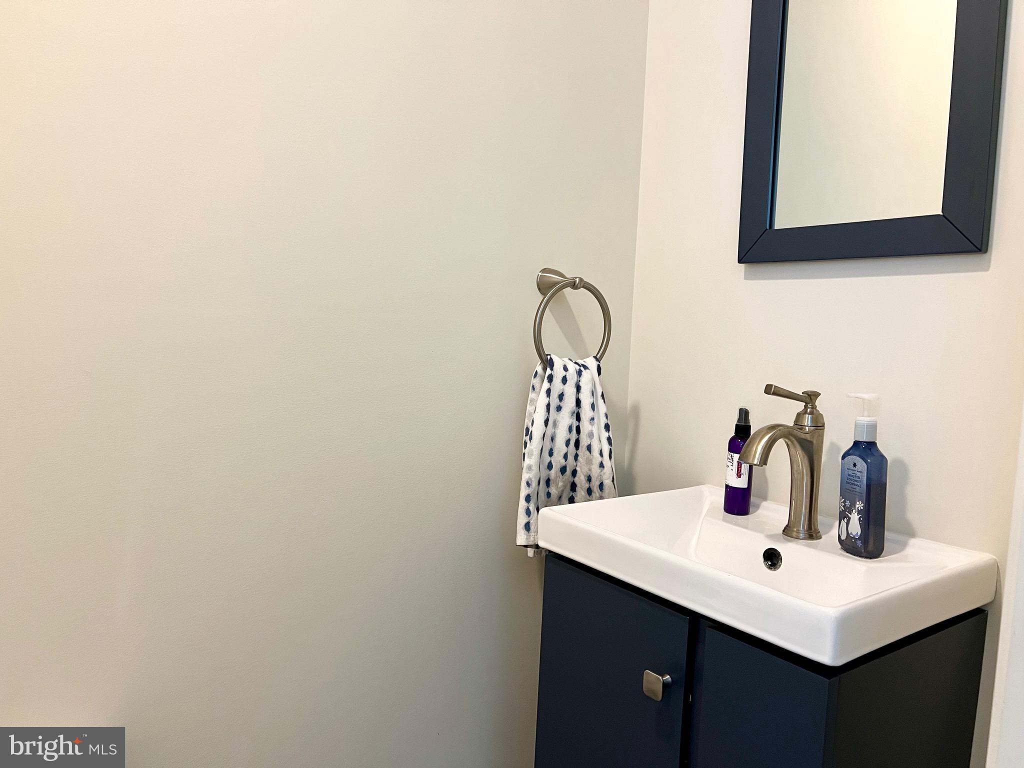 46 West Pittsfield Street Pennsville, NJ 08070 - Photo 9 of 25 a bathroom with a sink and a mirror
