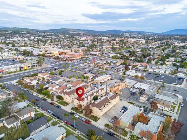 an aerial view of residential building and city view