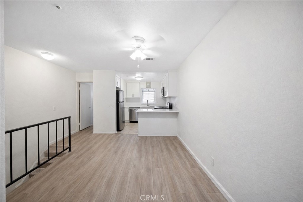 334 South Walnut Avenue Brea, CA 92821 - Photo 7 of 33 a view of a kitchen with wooden floor